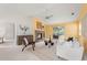 Inviting living room with a brick fireplace, neutral tones, and access to the screened patio at 1232 Corbett Ln, Orlando, FL 32806