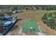 Aerial view of basketball court near pool and homes in a Gathering-friendly neighborhood at 1320 Corte Nueva, Winter Springs, FL 32708