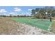 Outdoor basketball court with clear markings and well-maintained surface in community park at 1320 Corte Nueva, Winter Springs, FL 32708