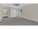 Spacious bedroom with a double closet, large window, and access to a private ensuite bathroom at 1320 Corte Nueva, Winter Springs, FL 32708