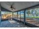 Covered patio with tile floor and view of the lake at 1320 Corte Nueva, Winter Springs, FL 32708