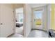 Hallway view to the entry door and bedroom at 1344 Hanoverian Dr, Lake Alfred, FL 33850