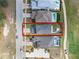 Aerial view of a property with a tile roof, pool and beautiful landscaping at 16112 Vetta Dr, Montverde, FL 34756