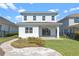 Exterior of the home features a brick paver patio, manicured lawn, and manicured landscaping at 16112 Vetta Dr, Montverde, FL 34756