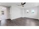 Spacious bedroom with hardwood floors, natural light, a ceiling fan, and neutral paint at 16112 Vetta Dr, Montverde, FL 34756