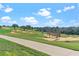 Scenic view of the golf course, sand traps and green space at 16112 Vetta Dr, Montverde, FL 34756