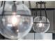 Modern, round pendant lighting with clear glass shades add a contemporary touch to the home at 16112 Vetta Dr, Montverde, FL 34756