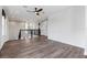 Open loft area with hardwood flooring, ceiling fan, railing, and natural light at 16112 Vetta Dr, Montverde, FL 34756
