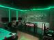 Recreation room featuring an air hockey table, foosball table, TV screens, and mood lighting at 1656 Moon Valley Dr, Davenport, FL 33896