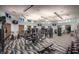 Spacious fitness center with modern equipment for a complete workout, promoting a healthy lifestyle at 1656 Moon Valley Dr, Davenport, FL 33896