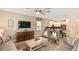 Open living area with TV and island seating at 1656 Moon Valley Dr, Davenport, FL 33896