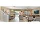 Open concept living area showing dining room, living room and pool view at 1656 Moon Valley Dr, Davenport, FL 33896