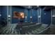 Enjoy movies in this in-house theater, complete with comfortable seating and a large screen at 1656 Moon Valley Dr, Davenport, FL 33896