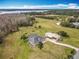 A property featuring a house, barn, and expansive lot offers ample space and privacy at 1680 Blackwelder Rd, De Leon Springs, FL 32130