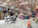Spacious barn interior featuring a variety of tools, equipment, and ample storage space for various projects at 1680 Blackwelder Rd, De Leon Springs, FL 32130