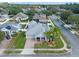 Aerial view of a beautiful single-Gathering home featuring an open front porch and manicured landscaping at 1943 Kodsi Ct, Winter Garden, FL 34787