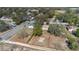 Bird's-eye view of the property, showcasing the home, lot, and neighborhood layout at 203 North E Blvd, Davenport, FL 33837