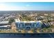 An aerial view showcasing a waterfront condominium with easy access to city amenities and picturesque water views at 225 W Seminole Blvd # 314, Sanford, FL 32771