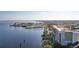 Waterfront condo with marina access and cityscape views, nestled amongst lush greenery and trees at 225 W Seminole Blvd # 314, Sanford, FL 32771