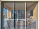 Screened-in balcony creates an ideal retreat with comfortable seating and natural light at 225 W Seminole Blvd # 314, Sanford, FL 32771