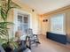 Cozy balcony with seating, plants, and ample natural light, perfect for relaxation and leisure at 225 W Seminole Blvd # 314, Sanford, FL 32771