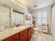 Full bathroom featuring a shower/tub combination and a wooden vanity with granite countertops at 225 W Seminole Blvd # 314, Sanford, FL 32771