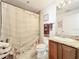 Full bathroom with a walk-in shower and granite countertops on the vanity at 225 W Seminole Blvd # 314, Sanford, FL 32771