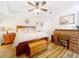 Bedroom featuring hardwood floors, a ceiling fan, and decorative nautical decorations at 225 W Seminole Blvd # 314, Sanford, FL 32771