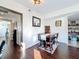 Bright dining room with wood floors and bar area at 225 W Seminole Blvd # 314, Sanford, FL 32771