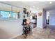Hallway next to wine rack, with kitchen window view and entryway to the living room at 225 W Seminole Blvd # 314, Sanford, FL 32771