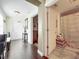 Inviting hallway with wood floors leads to bathroom and living areas at 225 W Seminole Blvd # 314, Sanford, FL 32771