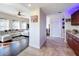Hallway adjacent to living room and kitchen, leading to a white door at 225 W Seminole Blvd # 314, Sanford, FL 32771