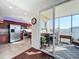 View of kitchen area, with stainless appliances and access to screened in porch at 225 W Seminole Blvd # 314, Sanford, FL 32771