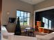 room features a chalkboard, play table, and cozy seating, creating a fun and inviting space for children at 2600 Avian Loop, Kissimmee, FL 34741