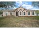 Charming single-story home featuring a well-manicured front lawn at 2655 Sheila Dr, Apopka, FL 32712