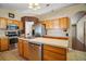 Kitchen featuring stainless steel appliances and wood cabinets at 2655 Sheila Dr, Apopka, FL 32712