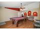 Spacious living room with hardwood floors and pool table at 2655 Sheila Dr, Apopka, FL 32712
