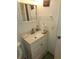 Updated half bathroom featuring new vanity and fixtures at 333 Lake Howard Nw Dr # 201C, Winter Haven, FL 33880