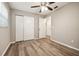Bedroom with wood flooring, closet, and neutral color scheme at 353 E Orange St, Altamonte Springs, FL 32701