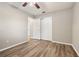 Bedroom featuring wood-look floors and closet space at 353 E Orange St, Altamonte Springs, FL 32701