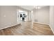 Open layout showing the living and kitchen area with modern appliances and ample natural light at 353 E Orange St, Altamonte Springs, FL 32701