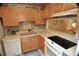 Efficient kitchen with modern appliances, plenty of storage, and a convenient layout, ideal for meal preparation at 4153 S Atlantic Ave # 1070, New Smyrna Beach, FL 32169