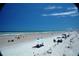 Picturesque sandy beach featuring a row of colorful umbrellas and tents, perfect for relaxation and recreation at 4153 S Atlantic Ave # 1070, New Smyrna Beach, FL 32169