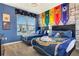 Themed bedroom featuring two beds, decorated with Harry Potter details at 4164 Paragraph Dr, Kissimmee, FL 34746