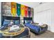 Whimsical bedroom with two beds, stone wallpaper, and themed decorations at 4164 Paragraph Dr, Kissimmee, FL 34746