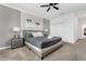 Stylish bedroom featuring neutral tones, modern decor, and comfortable furnishings at 4164 Paragraph Dr, Kissimmee, FL 34746