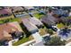 An aerial view of a residential home showing the roof, landscaping, and surrounding neighborhood at 4175 Sw 46Th Ct, Ocala, FL 34474