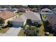 Aerial view of a single-Gathering home with well-maintained landscaping and a two-car garage at 4175 Sw 46Th Ct, Ocala, FL 34474