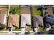 Aerial view of homes showcasing roof styles, driveways, lawns, and lot sizes at 4175 Sw 46Th Ct, Ocala, FL 34474