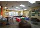 Bright game room featuring a pool table, bean bag chairs, and colorful tables at 4175 Sw 46Th Ct, Ocala, FL 34474